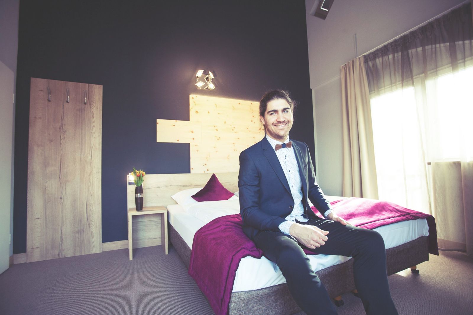 Gast im Doppelzimmer des Boarding House München